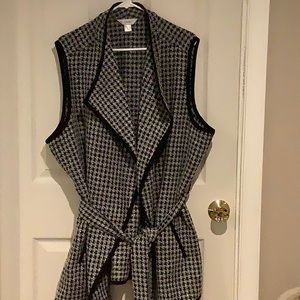 Vest like cover with belt